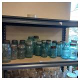 Shelf lot of vintage mason jars