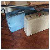 Lot of luggage and vintage aprons