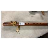 A handcrafted wooden Native American style flute
