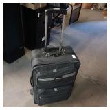 Carnegie luggage and faux flower and basket lot