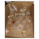 Flat of hand blown clear class ornaments