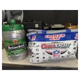 CoorsLight cooler bag and Heineken mini keg empty