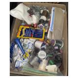 Flat of assorted sewing supplies