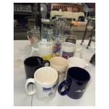 Lot of assorted collectible mugs and cups