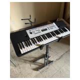 Yamaha YPT-260 electronic keyboard on stand