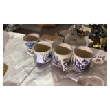 Set of 4 hand painted floral mugs