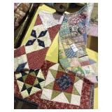 2 handcrafted quilted stockings and table runners