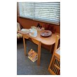 Light wood tapered drop leaf table with hinged