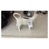 White porcelain cow milk creamer dispenser