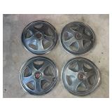 4 Vintage Datsun 240Z steel hubcaps