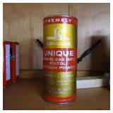 1 lb can of Hercules Unique reloading powder over