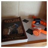 Bird dog book and dog training collar