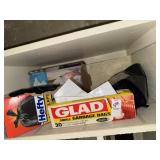 Shelf lot of assorted garbage bags