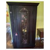 Vintage dark wood single-door armoire with hand