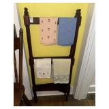 Antique floor-standing wooden towel rail with