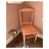 Pink wooden chair and wooden plant stand
