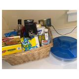 Wicker basket of coffee and tea supplies and