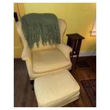 Vintage pale yellow wingback aid chair with