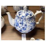 London Pottery blue and white floral teapot chip