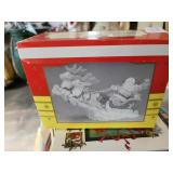 Santa in sled & flying Reindeer