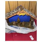 Vintage nativity scene with gold toned figures
