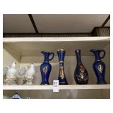 Cobalt blue vases, avon pitchers and ceramic bird