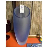 Contemporary blue satin art glass vase has small