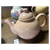 Salmon pink porcelain teapot