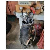 Golf bag with clubs