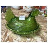 Vintage green glass hen on a nest with beaded rim