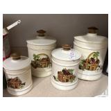 Vintage strawberry basket canisters shows wear