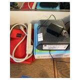 Motorola cable modem, powerstrip
