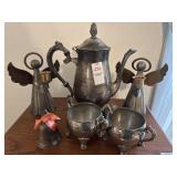 Silver toned tea-set, candle holders and bell