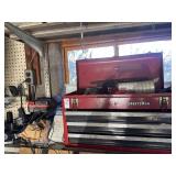 Shelf of Craftsman toolbox with assorted tools