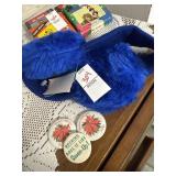 Vintage blue earmuffs and pins