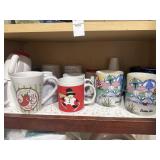 Shelf lot of assorted mugs