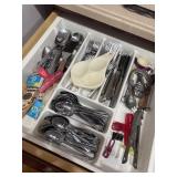 Drawer of flatware and misc kitchen utensils