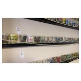 Shelf of Assorted Shot Glasses