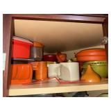 Shelf lot of 70s colored Tupperware