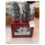 Silver plated Mr. & Mrs. Claus kissing S&P