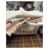 Basket of woven rugs