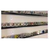 Shelf of Assorted Shot Glasses