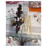 Glass shelf, candles and decorative wall sconce