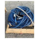 PALLET WITH BLUE HOSES AND CAMLOCK FITTINGS, 1'