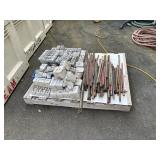 PALLET WITH CONCRETE STAKES & DOBIE BLOCKS