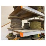 ASSORTED SPOOLS OF ROPE. 3RD SHELF