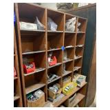 SHELVING UNIT WITH ASSORTED CONDUIT HANGER CLAMPS