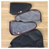 Several Handgun Pouches  -  16"