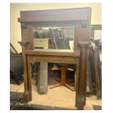 Antique Wooden Fireplace Mantel featuring a Built-