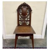 Early 20th Century Intricately Carved Wooden Chair
